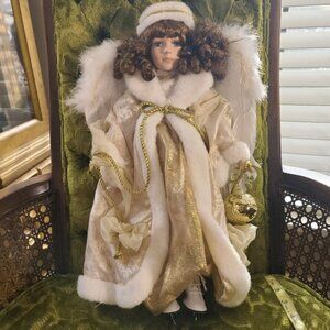Porcelain Angel Doll with Feathered Wings